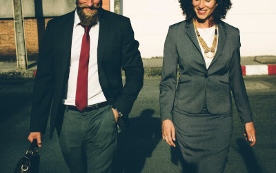 man and woman in business attire