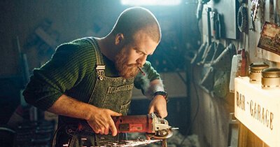 Man operating circular saw