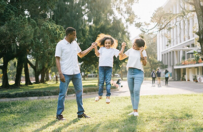 Parents playing with child