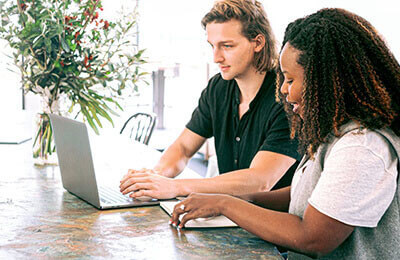 Man and woman at laptop