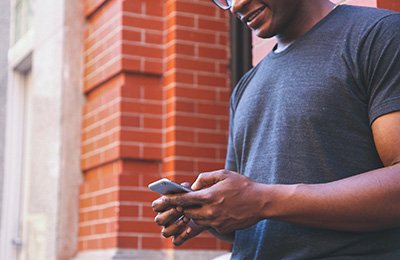 Man texting on his mobile phone