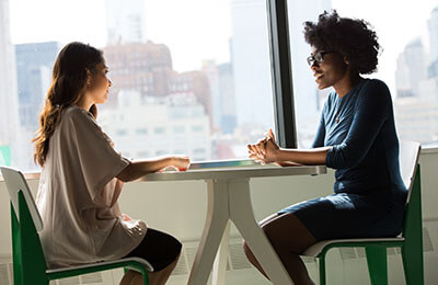 Two women talking