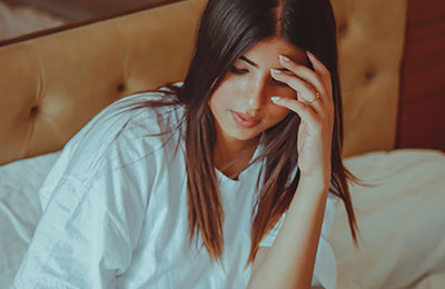 Woman resting in bed