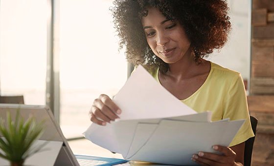 Woman with Paperwork